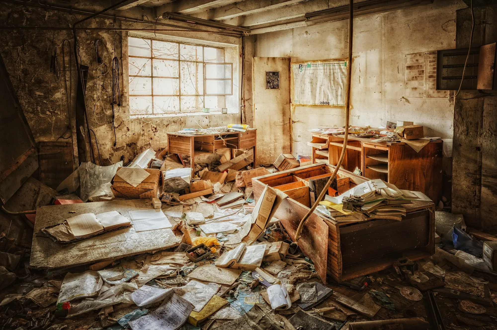 Abandoned room with debris and fallen material